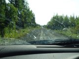 DSC01504  lange lange grusveje .. og de sten de  de bruger er meget hårde/skarpe = punktering stor risiko (Björn har et egen lille vulkaniserings kit med i bilen..selv 4x4 trucken har punkteret her oppe)